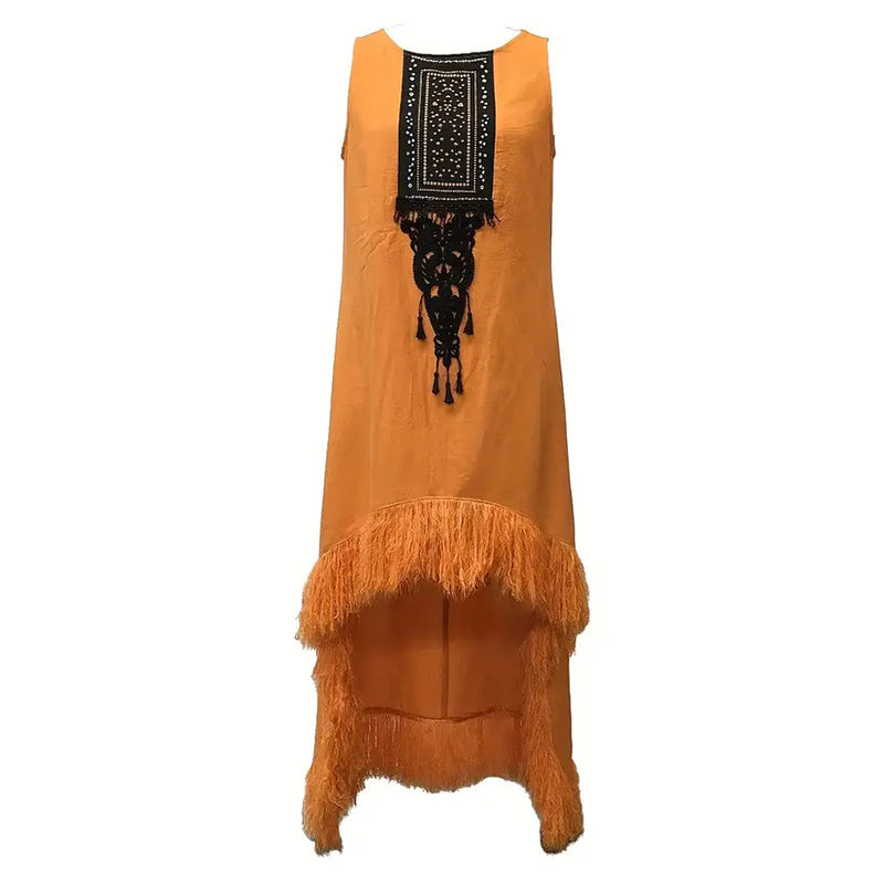 Western fringe dress paired with cowboy boots