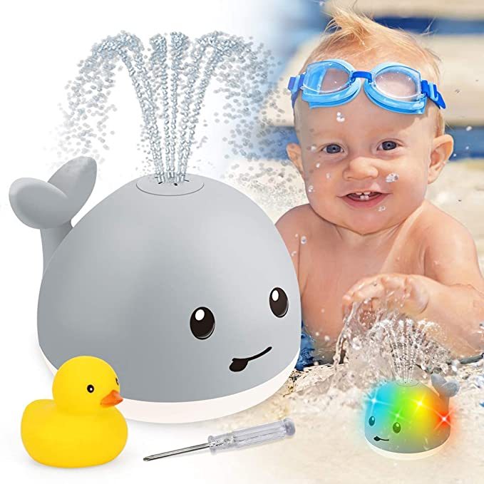 Water-spraying whale toy with colorful lights
