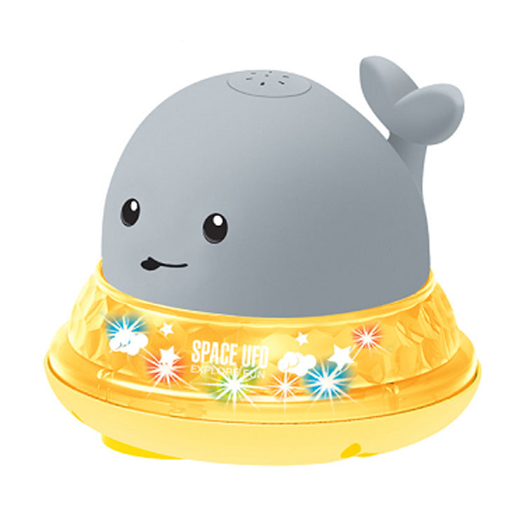 Interactive whale toy for baby bath time