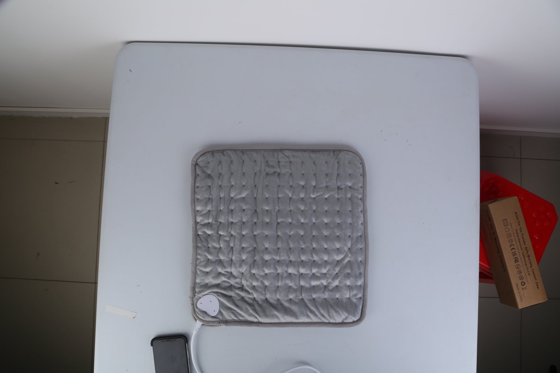 Portable electric foot warmer with controller